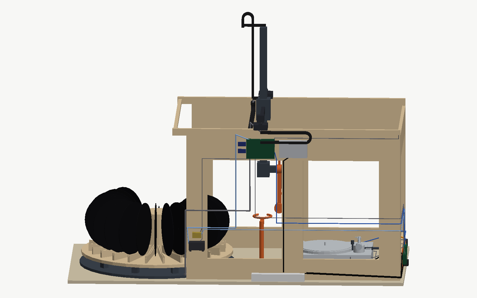 The rear of the machine: the controller group under the X beam, the pump and valve near the open end, the X chain in its trough, the cables climbing the panel